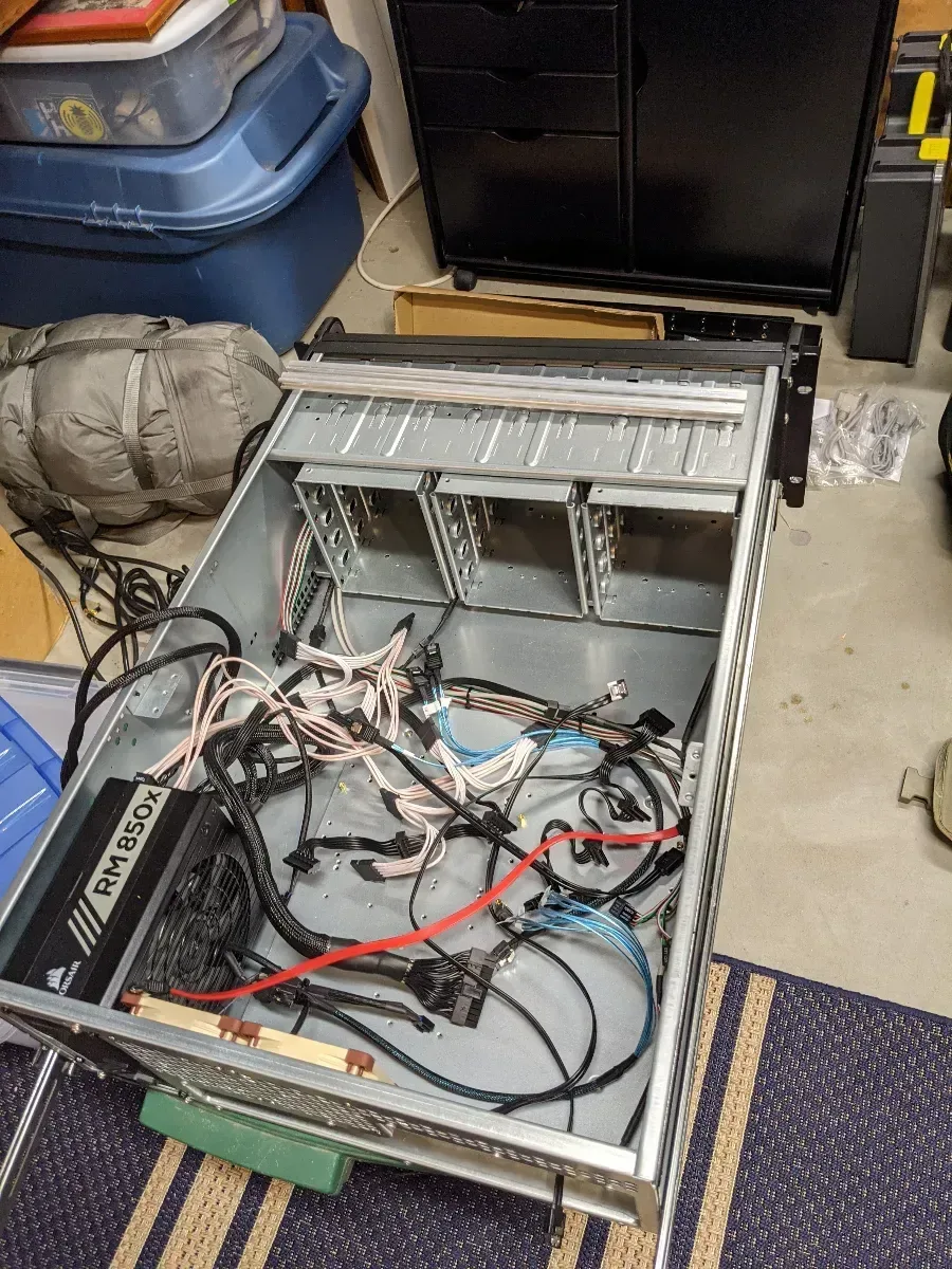 Open rackmount server chassis showing its internal components and cabling.